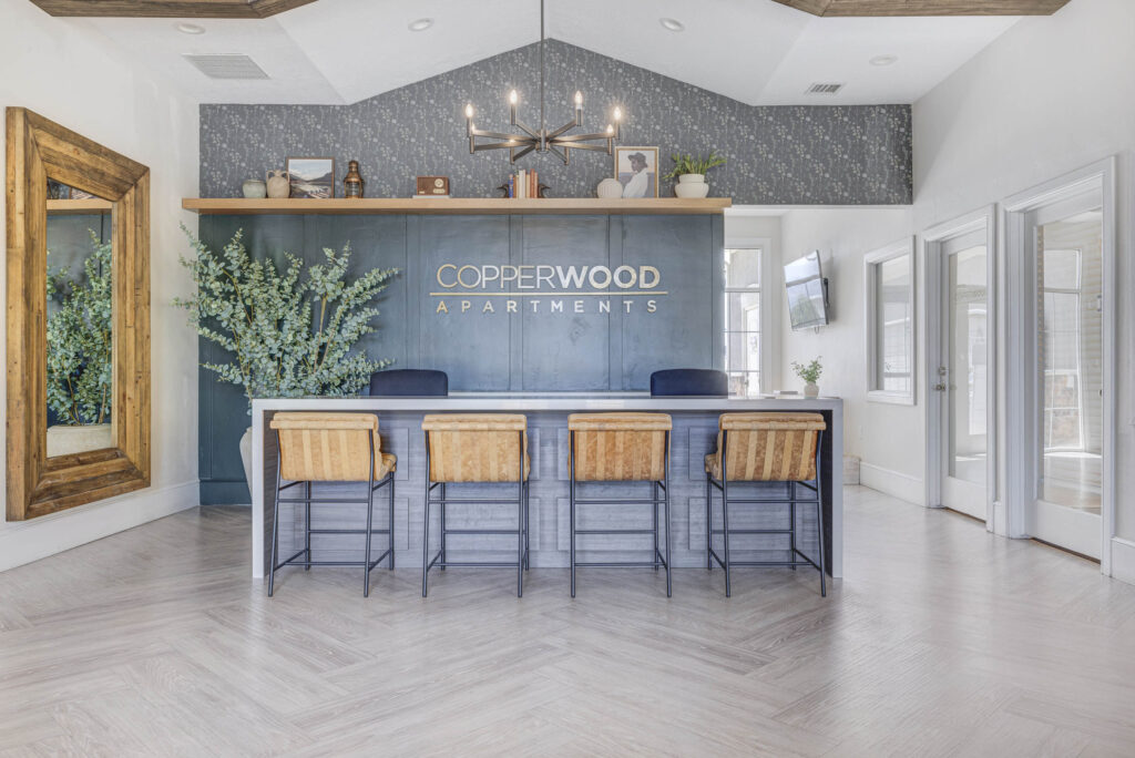 Leasing office counter and chairs at Copperwood luxury apartments in Herriman, Utah.